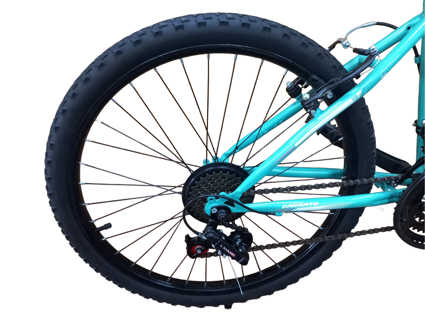 Turquoise bicycle wheel with black tire on a white background