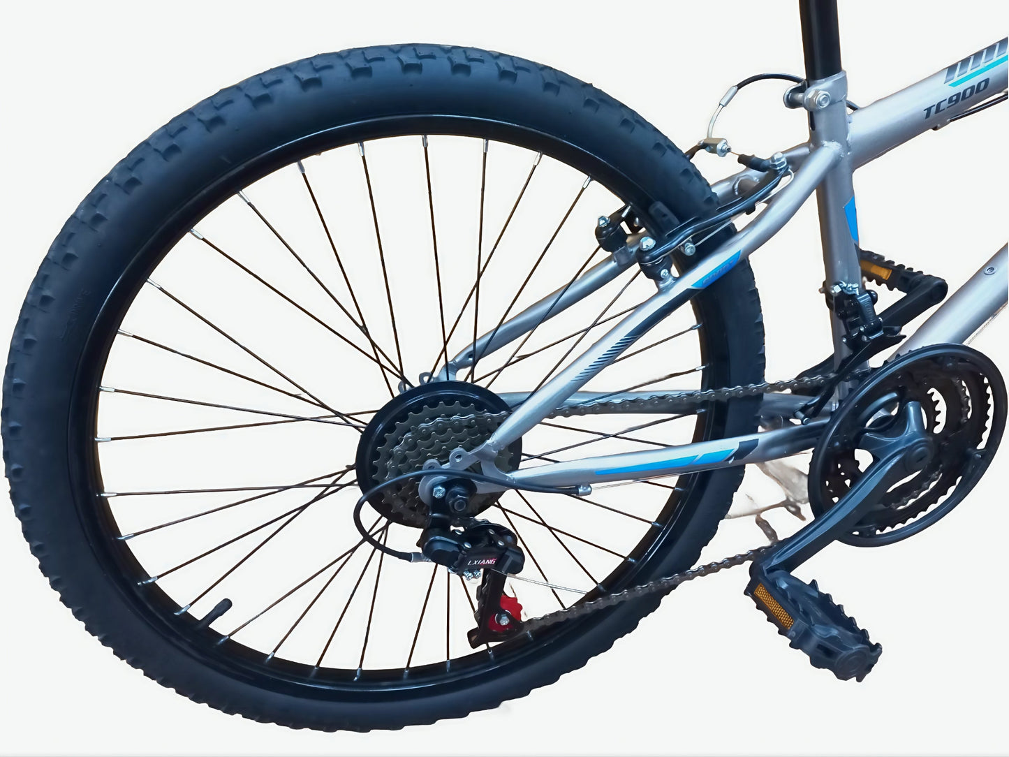 Close-up of a bicycle wheel and frame on a white background